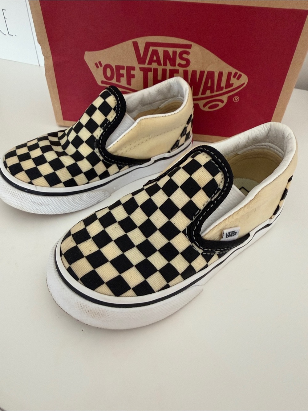 Vans Kids Slip-On Checkerboard Sneakers in Black & Cream